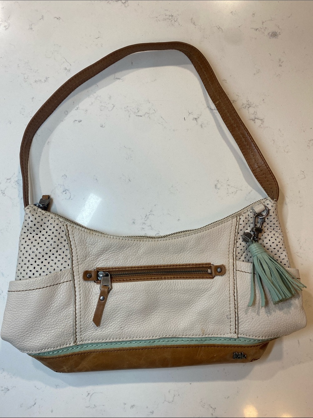 The Sak Kendra Leather Hobo Shoulder Bag Cream Tan Perforated with Mint Tassel